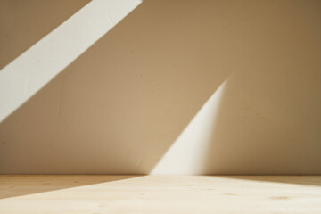 Table and geometric shadow on beige wall . Cream white color background for mockup or product presentation	
