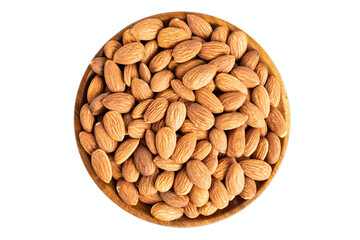 Fresh natural healthy almonds nuts on a wooden plate.