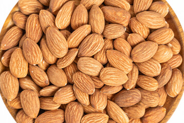 Close up with many fresh organic peeled almonds . Natural texture background.