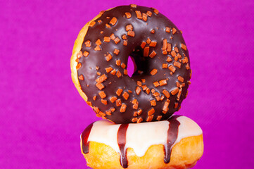 Set of doughnuts on colored background.
