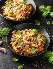 Creamy Tuscan pasta with minced beef, sun dried tomatoes, spinach and parmesan cheese