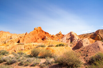 landscape of Skazka canyon on Issyk-Kul lake. Rocks Fairy Tale famous destination in Kyrgyzstan. Mountain like great wall of china and Rainbow Mountains of Danxia or Antelope crevice USA. Central Asia