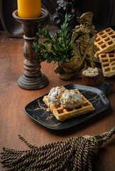 Viennese waffles with ice cream and caramel in vintage royal style