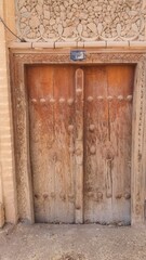 Wooden old door in rural area