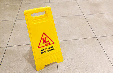 Banner with caution wet floor after cleaning