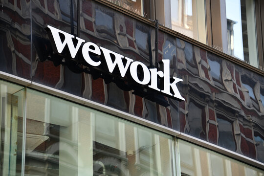 Hamburg, Germany - January 29, 2024: The wework logo in Hamburg, Germany - wework is a global network of workspaces for freelancers, startups an small business