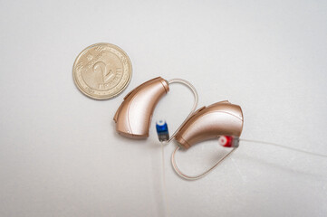 hearing aid isolated on white background. Close-up view, hearing aids for the deaf, the latest technology