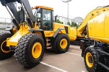Fleet of yellow construction machines
