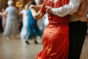 A man and a woman in formal wear are dancing together on the dance floor
