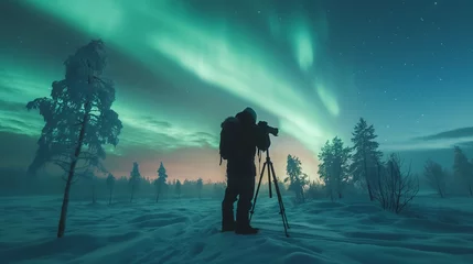 Fotobehang Capturing the Arctic Glow Photographer in Snowy Wilderness with Northern Lights © Dimitri