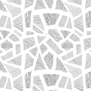 Seamless black and white pattern of scribbled patchy mosaic with fuzzy freehand texture. Minimalist grunge doodle background.