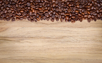Roasted coffee beans background. Coffee Beans on Wood Background