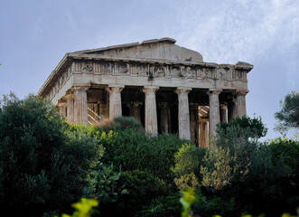 Obraz premium The Temple of Hephaestus, (Theseion), is a Doric peripteral temple in the ancient Agora of Athens, Greece, atop the Agoraios Kolonos hill, it is one of the best preserved ancient Greek temples