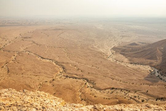 The Najd desert wasteland landscape panorama view from Jabal Tuwaiq, Riyadh, Saudi Arabia