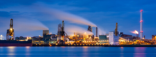 Oil refining. Heavy industry. View of production and factory. Emission of harmful substances into the atmosphere. Photo for background, advertising and wallpaper. - 745426993