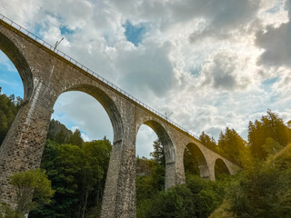 Fototapeta na wymiar The Ravenna Bridge Viaduct, located within the Black Forest in Germany. The bridge is a 190 ft high and 738 ft long railway viaduct on the Höllental Railway line in Breitnau, Breisgau-Hochschwarzwald.