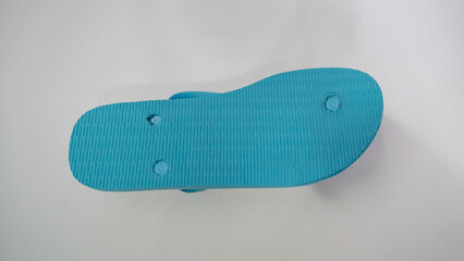 Blue flip-flops with white base