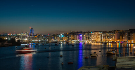 Beautiful night cityscape and coast in Sliema, Malta