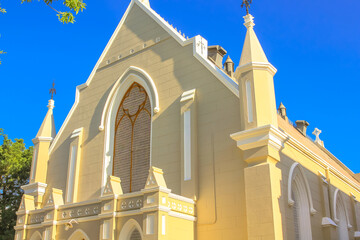 central facade of the Victorian-Gothic Mother Church in Graaff-Reinet, Eastern Cape, Great Karoo, South Africa. Facade of historical Dutch church, built 1886, in the city downtown.