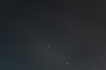 Starry sky over Estonia, the Orion nebula and stars. Photo background texture.