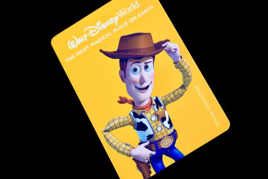Walt Disney World Ticket Card. Cards store a digital pattern that activate access to thrill rides and roller coasters. Orlando, Florida, USA, February 12