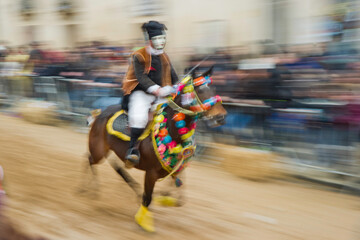 Traditional mask of the horse Sartiglia race in Sardinia , Sartiglia 2013. Oristano, in fast motion...