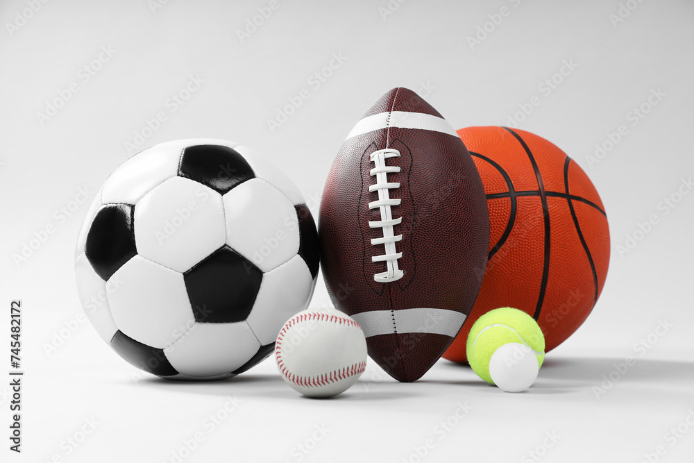 Poster Many different sports balls on light gray background