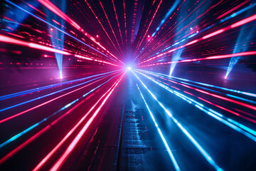 Vibrant red and blue laser light beams radiating from a central point on a dark background, ideal for music event promotions or futuristic concepts with copy space