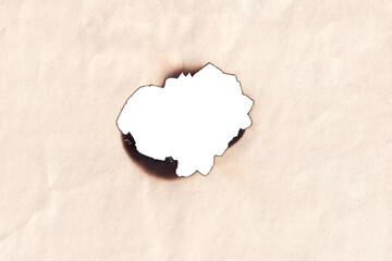 hole in paper. Burnt piece of paper. burnt paper texture. piece torn burned edge. old piece of...