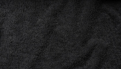 Black plush fleece fabric texture background , background pattern of soft warm material with copy space for text