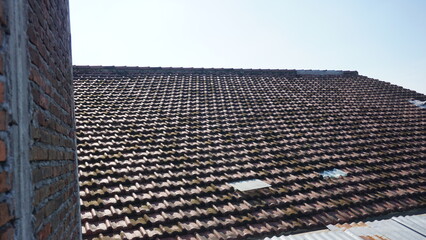 The neatly arranged tile roofs form a texture 