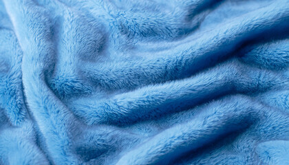 Blue delicate background of nice furry cloth. Soft loose folds on the fabric of faux fur of blue classic color as textured background. Selective focus - Powered by Adobe