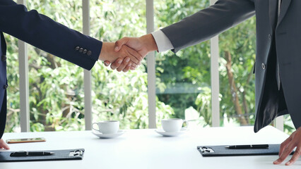 Team Business Partners shaking hands together to Greeting Start up new project. Shakehand Teamwork...