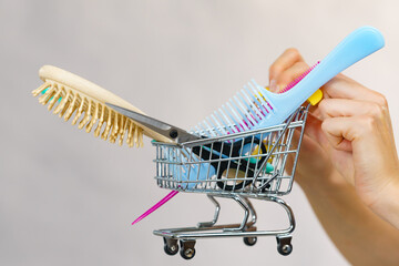 Girl with hair accessories in shopping cart