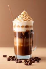 an iced coffee with whipped cream and chocolate drizzle