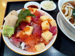 The bowl of rice with sashimi and sweet egg, Japanese food