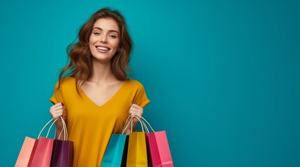 Fototapeta na wymiar Joyful and Happy Woman with Colorful Shopping Bags