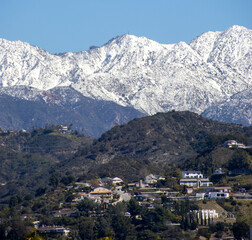Fototapeta na wymiar Snowy Mountaintops in California, San Gabriel Mountains & Valley