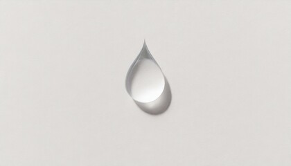 Fototapeta premium One transparent water drop. White paper background - top view 