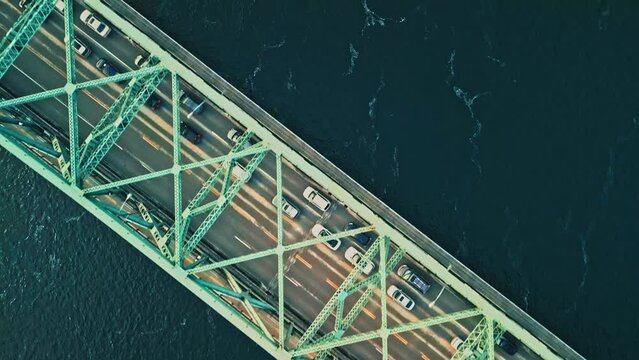 Montreal, Canada - Feburary 25 2024: Drone aerial view of Jaque Cartier Bridge over the Saint Laurant River in Montreal