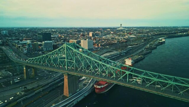 Montreal, Canada - Feburary 25 2024: Drone aerial view of Jaque Cartier Bridge over the Saint Laurant River in Montreal