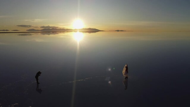 Aerial orbits sunset salt lake photo shoot, photographer and model