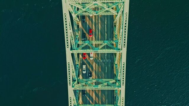 Montreal, Canada - Feburary 25 2024: Drone aerial view of Jaque Cartier Bridge over the Saint Laurant River in Montreal