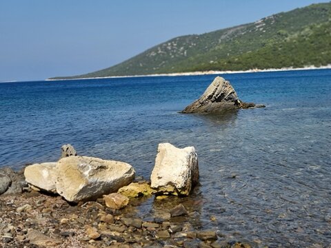 skyros or skiros island, pefkos beach pine trees beside the sea summer destination in greece