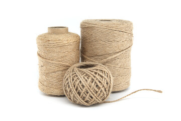 Spools of jute twine isolated on white background