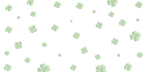 Shamrocks or clover leaves are isolated in the background with space to celebrate St. Patrick's Day. 