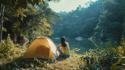 Tuinposter Asian woman travel and camping alone at natural park in Thailand. Recreation and journey outdoor activity lifestyle © Dianne