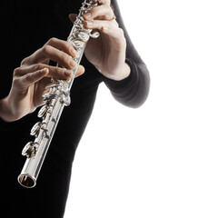 Flutist hands playing flute music instrument - 745548573