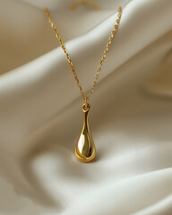 A little tears gold toned pendant necklace