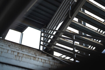 Metal overpass platform with banister structure of the factory place. Industrial building part....